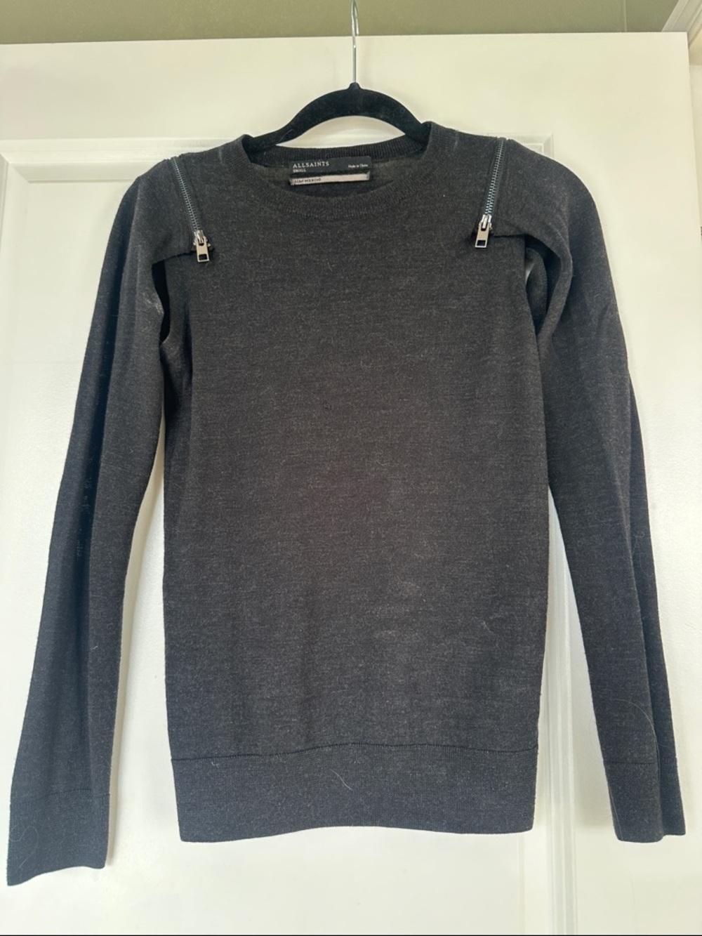 AllSaints Black merino wool Crewneck top with detachable sleeves.